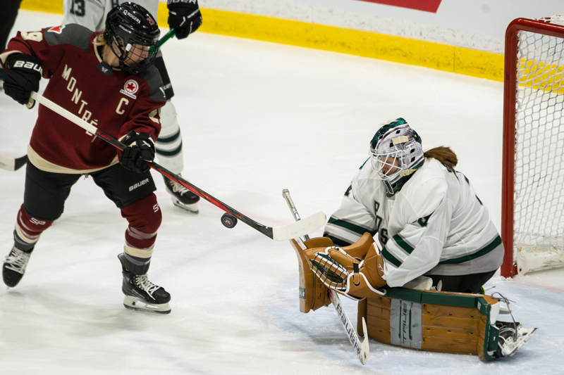 Montreal's Marie-Philip Poulin tries to bat home a rebound on Boston's Aerin Frankel. | photo: Kieron Yates / Modern Free Press