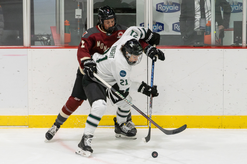 Montreal's Mariah Keopple and Boston's Hilary Knight battle for the puck. | photo: Kieron Yates / Modern Free Press