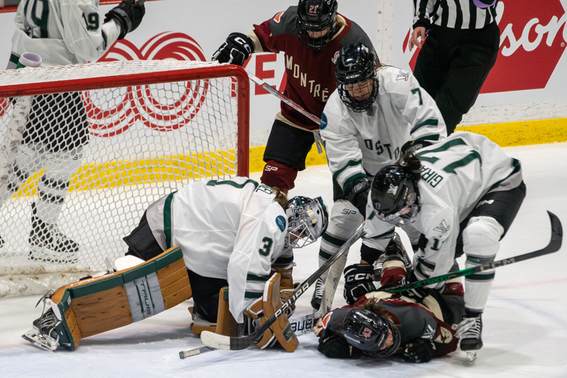 Boston's Taylor Girard cross-checks Montreal's Kristin O'Neill. | photo: Kieron Yates / Modern Free Press