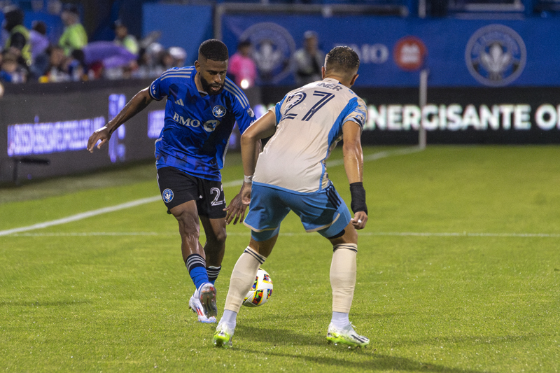 Ruan of CF Montreal takes on Kai Wagner of Philadelphia Union during MLS action at Stade Saputo on June 29, 2024.