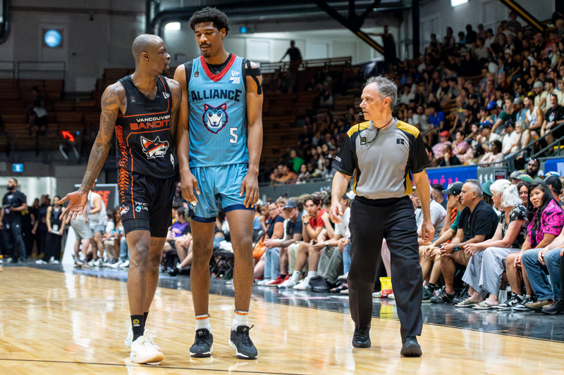 Taze Moore of the Vancouver Bandits and Chris Smith of teh Montreal Alliance have a chat at the Verdun Auditorium on July 28, 2024. CEBL.