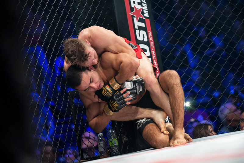 Hill attempts a submission on Alaoui || photo: Kieron Yates