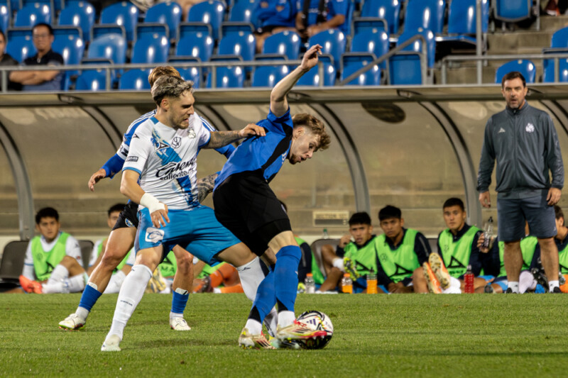 CF Montreal's Efrain Morales defends against Club Puebla's Emiliano Gomez at the Leagues Cup in Montreal, August 5, 2025. Photo: Kieron Yates / MFPIB