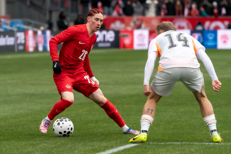 Marcelo Flores of Canada challenges Kristall Máni Ingason of Iceland during an internatioal friendly held at BMO Field in Toronto on March 28th, 2026. Photo: Kieron Yates