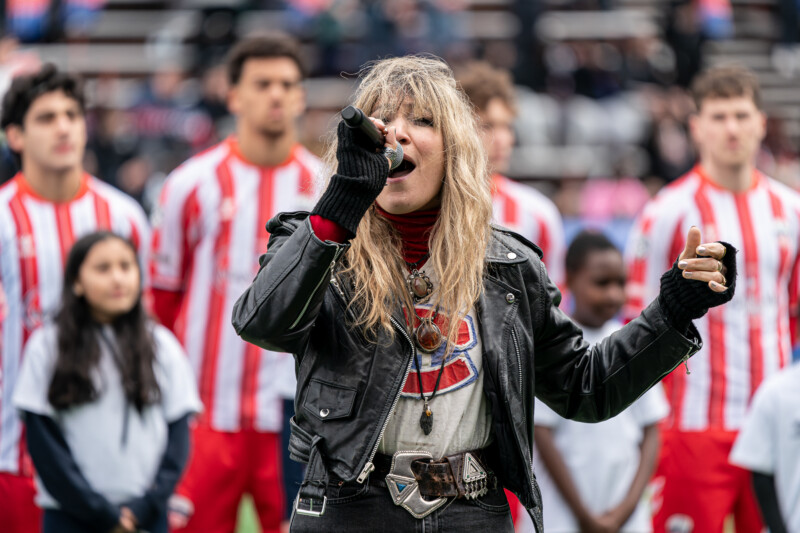Lee-la Baum of The Damn Truth performs the Canadian national anthem at CEPSUM, ahead of their first home match, versus Athletico Ottawa, in FC Supra's history in the CPL. April 19th, 2026. Photo: Kieron Yates